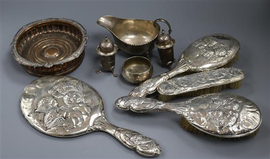 Three silver condiments, a silver sauceboat, silver brushes(a.f.) and a plated coaster.